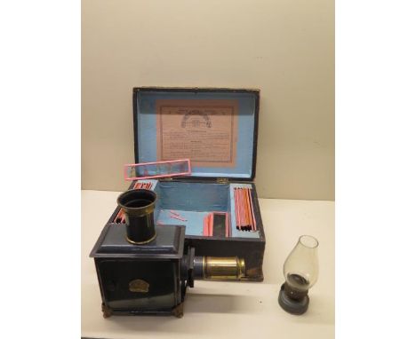 A German Lanterna Magic child's lantern no 2 with slides burner and lens - in original box - box 27cm wide 