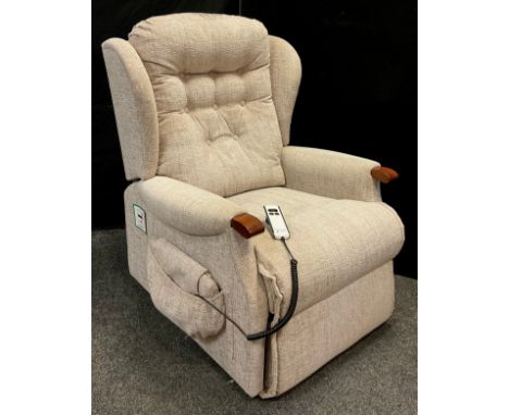 A Sherborne ‘Lynton’ model electric riser recliner armchair. 