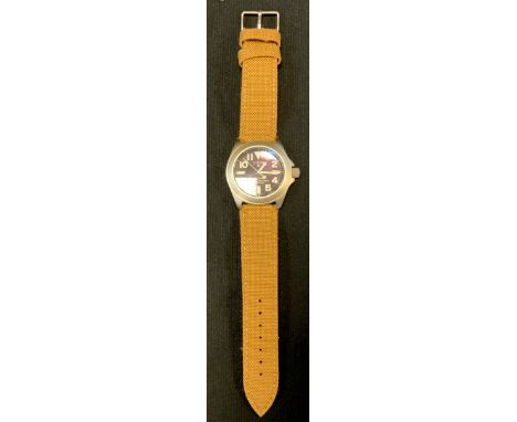 A Citizen Eco-drive Ray Mears Titanium cased wristwatch, model 7828-H09971 TA, 20 bar water resistant, woven leather strap 