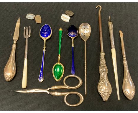 Three enamel and silver gilt jeweled tea spoons; a Scottish silver mote spoon; a silver and mother of pearl pen; etc (11) 