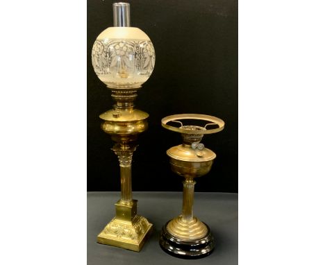 A Victorian brass Corinthian column table lamp, formerly an oil lamp, frosted and clear glass shade,  75cm high overall;  an 