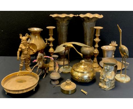 A pair of brass Persian style vases, 31cm; a pair of brass candlesticks; pair of model cranes; Viking warrior; Toby jug; cham
