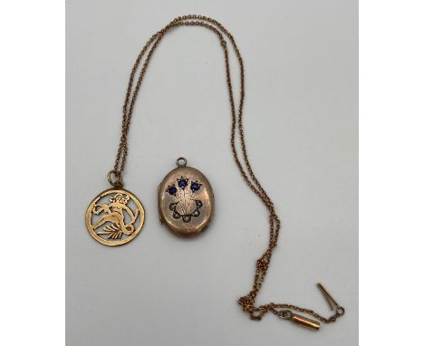 A 9ct gold pendant, 9ct gold chain and a 9ct gold locket designed with three blue stones and 5 seed pearls. [7.20grams] 