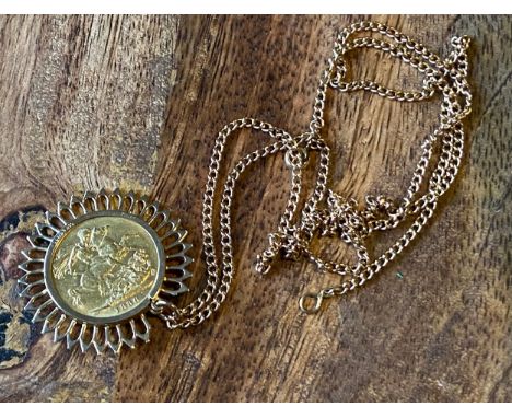 An 1886 Young Victorian Head full sovereign coin, Fitted within a 9ct gold pendant and comes with a 9ct gold chain. Chain cla