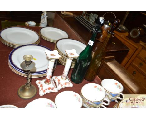 Two coloured glass bottles and stoppers; a pair of Coalport "Indian Tree" coral pattern candlesticks and a brass candlestick
