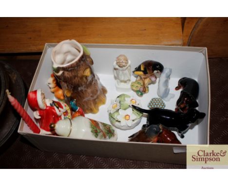 A box containing various ornaments to include Beswick, Staffordshire, Royal Worcester etc.