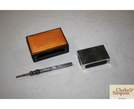 A silver match boxholder; a brass matchbox holder with peach enamel work and a silver propelling pencil