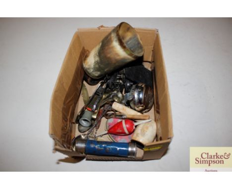 A 19th Century horn beaker, fishing lures, small brass horse door knocker etc.