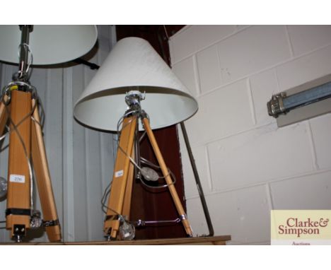 An adjustable tripod lamp and shade 
