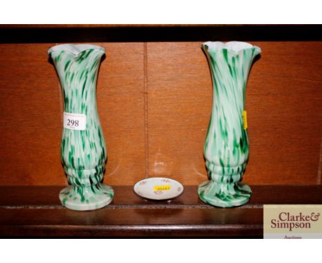 A pair of green glass vases; and a silver and enamel dish (silver to be viewed in cabinet)