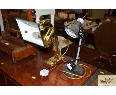 A brass desk lamp with green shade and one other 