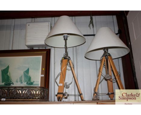 An adjustable tripod lamp and shade 
