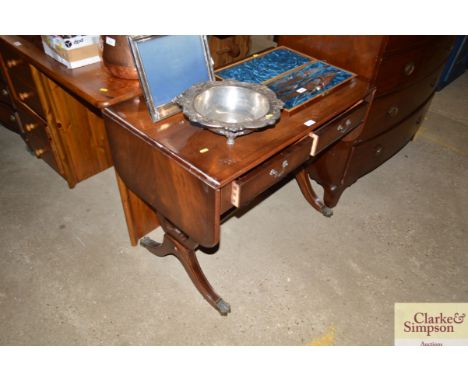 A mahogany sofa table