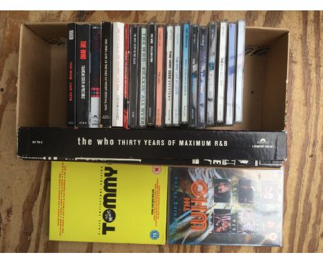 A box of Who CDs including a 'Thirty Years of Maximum R&B' box set.