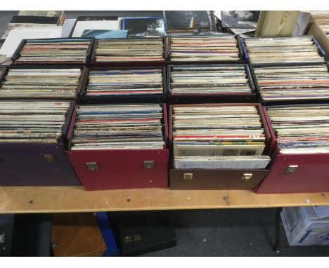 Twelve boxes of LPs by various artists including The Beatles, Bob Dylan, The Grateful Dead, Billy Fury and many more.