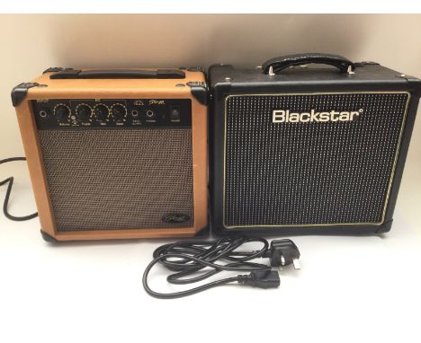 Two practice amplifiers comprising a Blackstar HT-1 and a Stagg 10A.