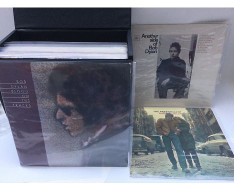 A record case of Bob Dylan LPs including 'Another Side Of Bob Dylan', 'The Freewheelin', 'Desire' and others.