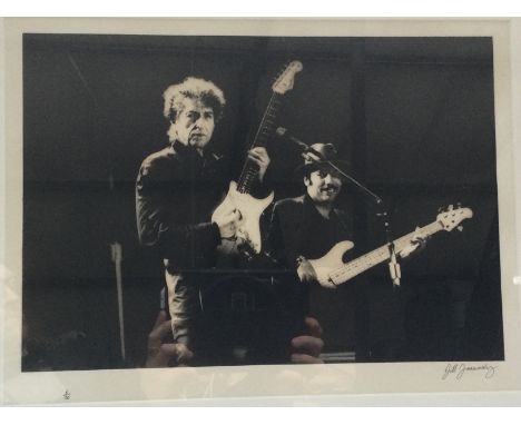 A framed and glazed limited edition print of Bob Dylan by acclaimed music photographer Jill Furmanovsky, signed and hand numb