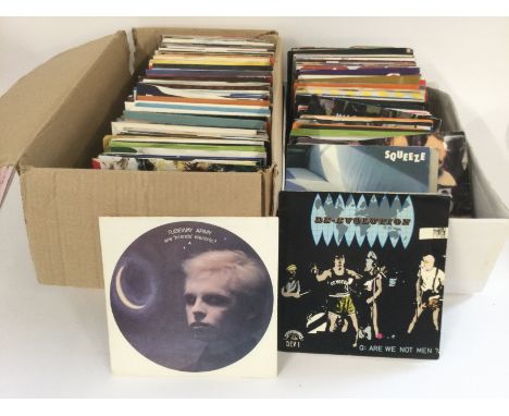Two boxes of 7" singles by various artists including Tubeway Army, Tears For Fears, Devo and many more.