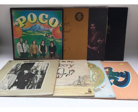 Sixteen folk rock and country LPs by various artists including Bob Dylan, The Eagles, Poco, Jonathan Edwards and others.