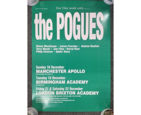 A collection of music posters of various artists comprising The Pogues, Bob Dylan, Bryan Adams and others.