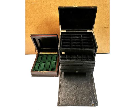 Two vintage watch cases.