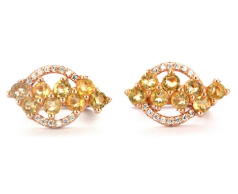 A pair of 925 silver rose gold gilt drop earrings set with round cut citrines and white stones, L. 1.5cm.