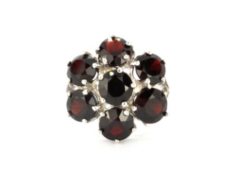 A 925 silver garnet set cluster ring, (Q).