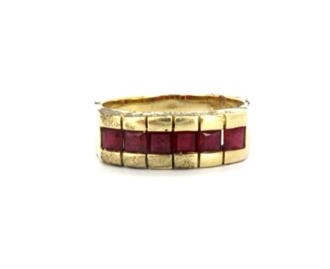 A 14ct yellow gold (stamped 585) ruby set ring, approx. 5.4gr, (O).