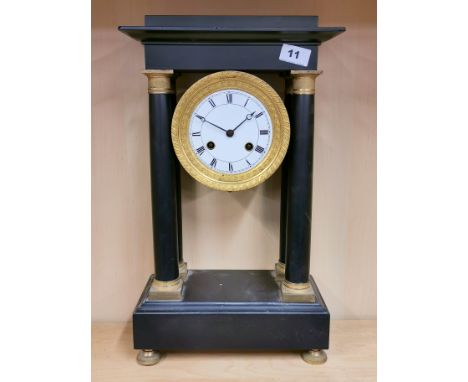 An early 19th century French slate striking Portico clock, H. 48cm. Condition: case appears sound, no pendulum. Working condi