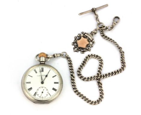 A hallmarked silver open face pocket watch with a silver and gold Albert chain and fob, Chester c. 1912 . Condition  : unders