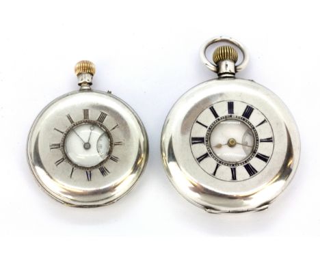 A 935 silver half hunter pocket watch together with a silver half hunter pocket watch. Both understood to be in working condi