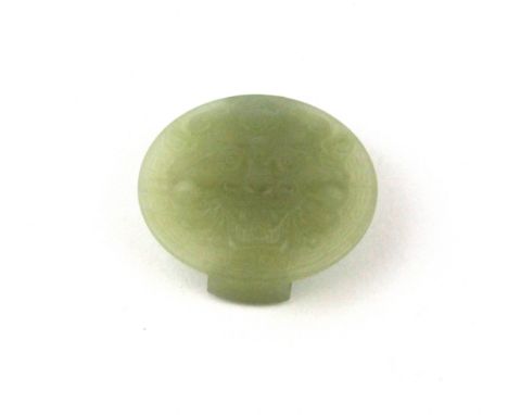 A Chinese carved nephrite jade belt buckle, Dia. 5.8cm.