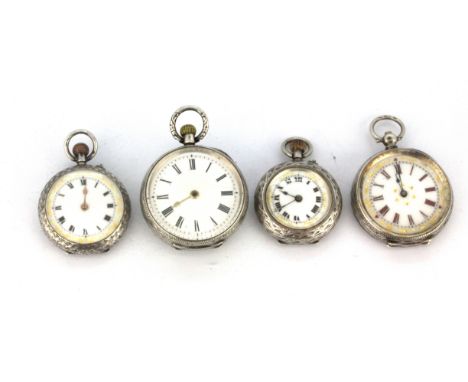 Four silver lady's open face pocket watches. Condition : two are missing hands, understood to be in working condition.