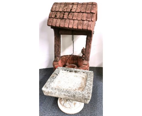 A vintage concrete garden wishing well, H. 82cm, together with a carved stone bird bath.