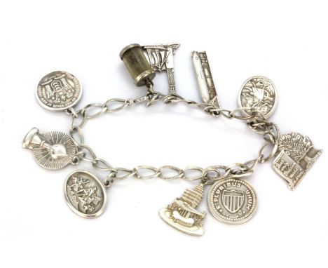 An American sterling silver charm bracelet, L. 17cm.