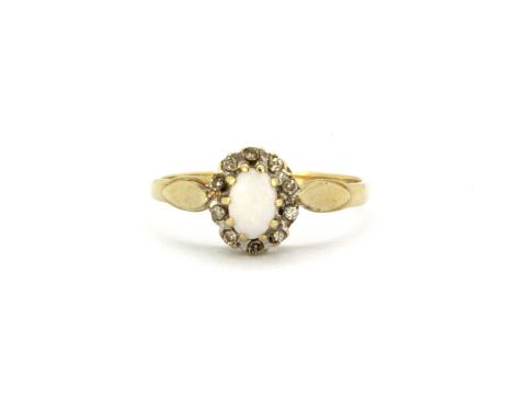 A 9ct yellow gold opal and diamond set cluster ring, (P.5).