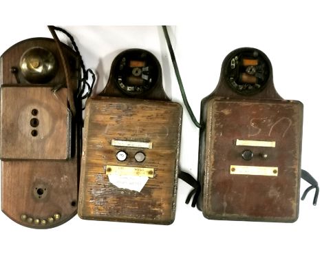 Three vintage items of telephonic equipment.