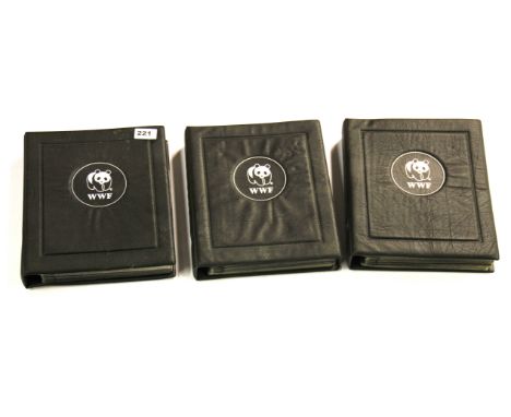Three albums of World Wildlife Fund First Day cover stamps.