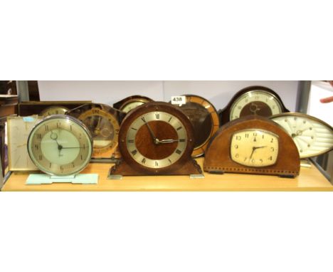 Ten vintage mantle clocks. Condition: working condition unknown.