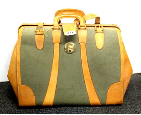 A vintage canvas and leather bag, W. 56cm.
