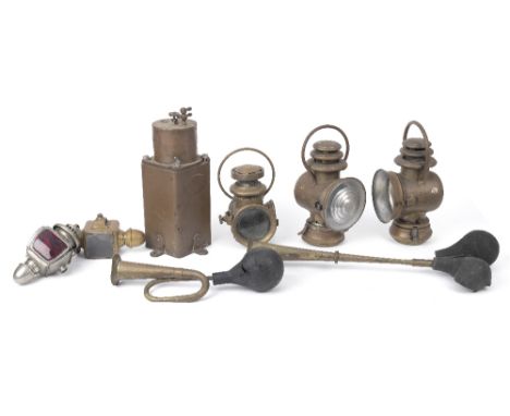 A Dietz No.5 'Handy Gas Generator' and assorted lamps,the brass Dietz acetylene lamp generator with some minor dents and old 