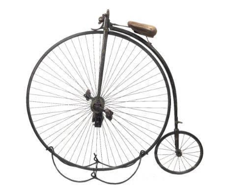 A Singer 52 inch Ordinary bicycle, formerly the property of John William Evans,painted black with traces of coach-lining, tap