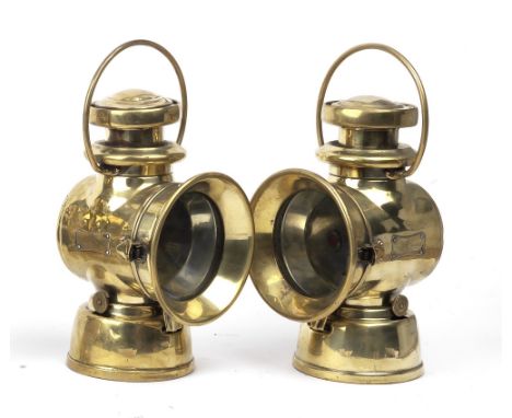 A pair of 720 series oil-illuminating side-lamps,polished brass bodies, comprising a No.721 right side lamp (some denting), a