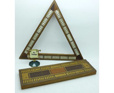 Two cribbage boards and a Bridge stand 
