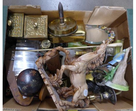 A brass trench art ashtray, brass cigarette box, Barbola mirror, metal and onyx lamp base, wall light fitting and other decor