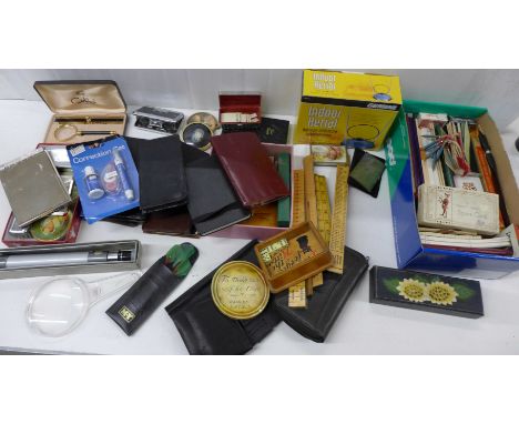 A box of playing cards, wallets, folders, notebooks, tweezers, magnifier, etc. **PLEASE NOTE THIS LOT IS NOT ELIGIBLE FOR POS