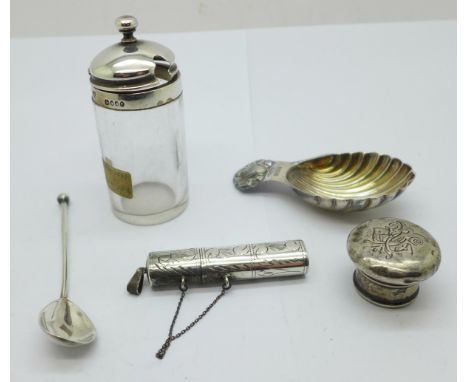 A silver tea caddy spoon, a Victorian silver topped mustard pot with later silver spoon, a 925 silver needle case and a bottl