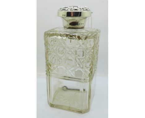 A silver and cut glass locking decanter, Birmingham 1903, with key