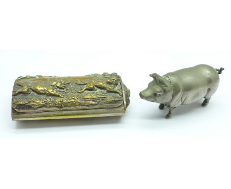 A novelty pig vesta case and a vesta case with hunting scene 